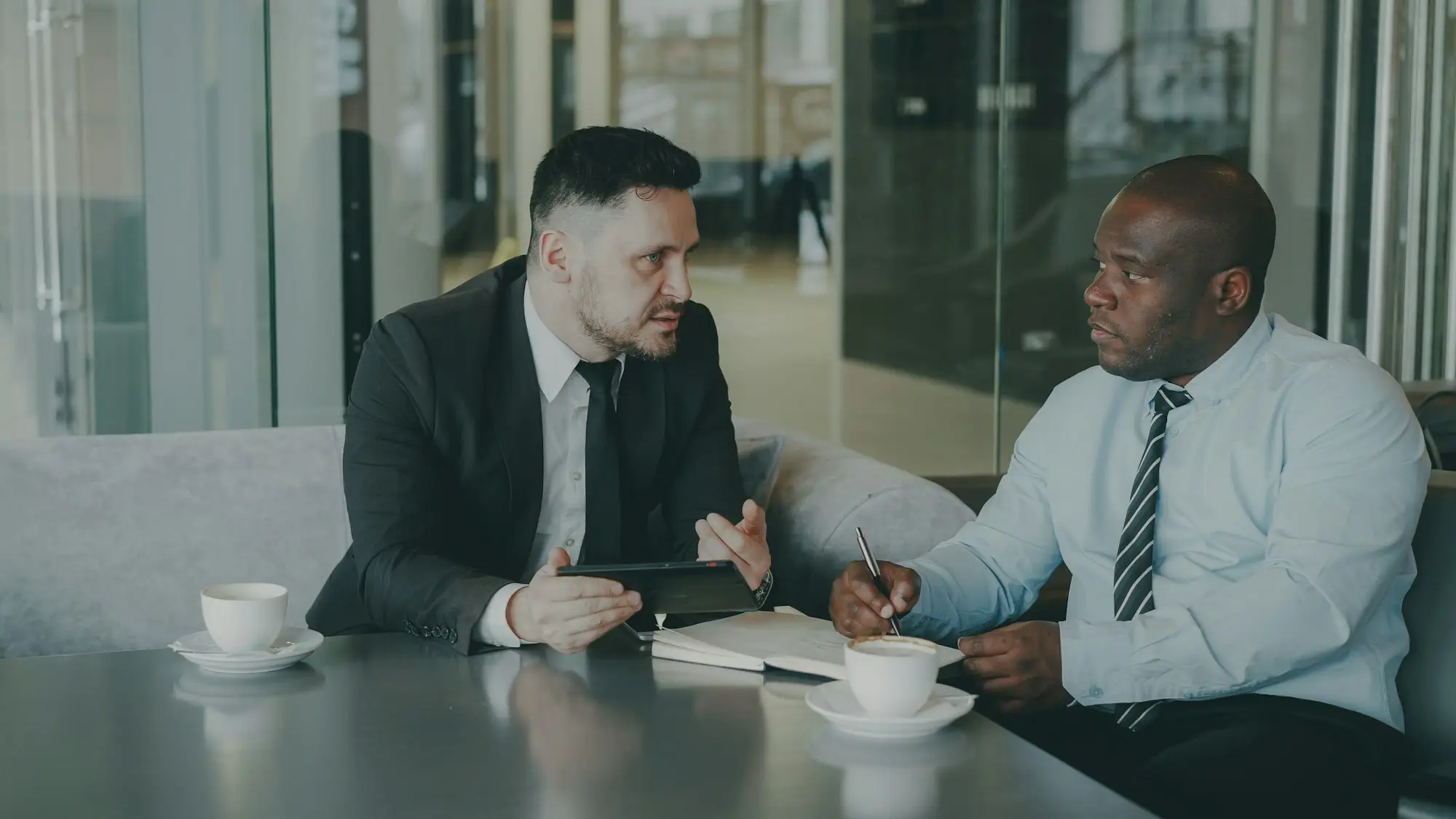 Accountant meeting a client to review documents