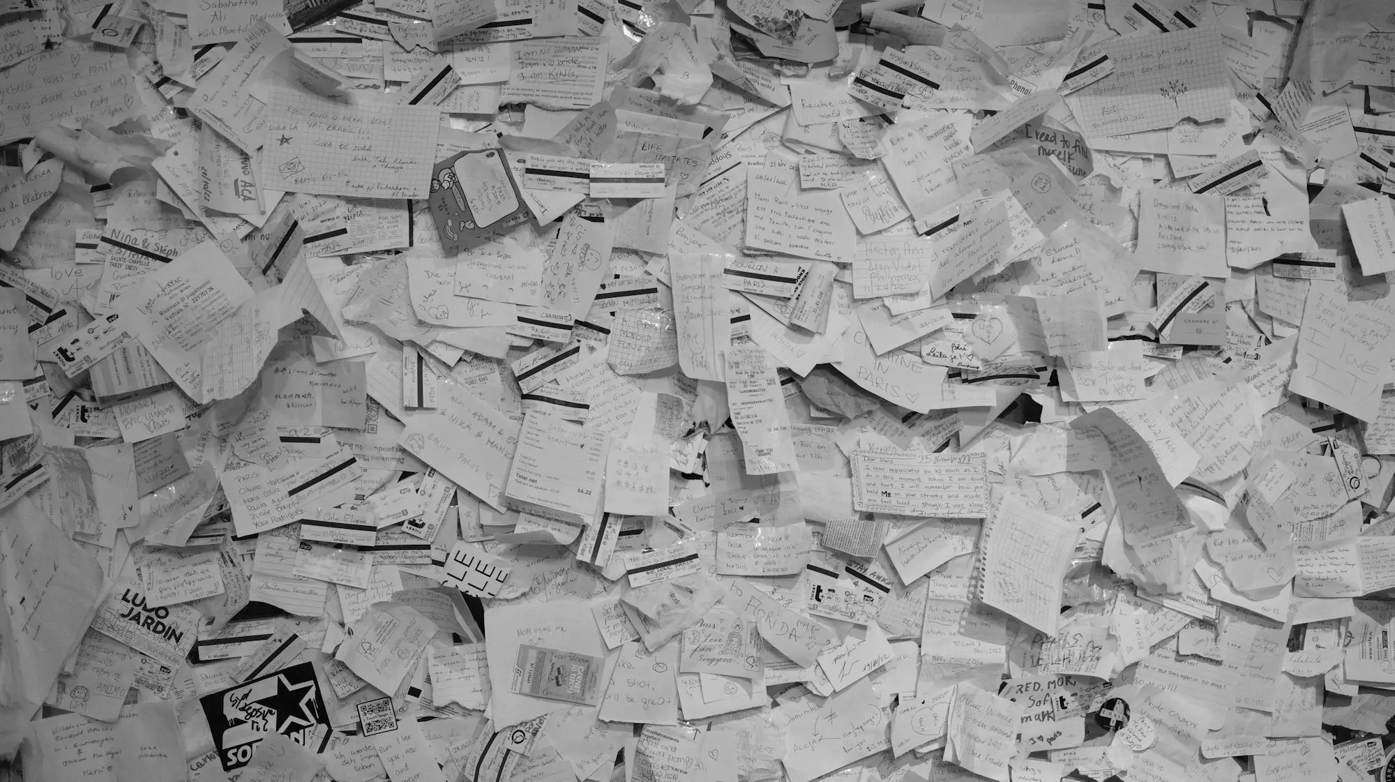 Pile of paper receipts waiting to be sorted